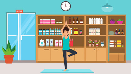 Happy woman in a turquoise tank top and grey leggings doing a yoga tree pose.