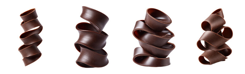 Chocolate curls arranged into decorative towers on white. Confectionery art, dessert garnish, sweet treat, decadent, chocolate making, patisserie, gourmet.