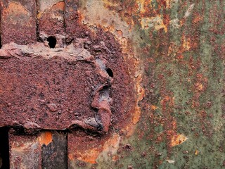 Welded, rusty plate texture.
