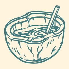 Coconut bowl with drink and straw