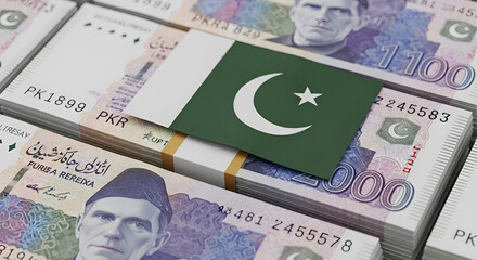 A stack of pakistani rupees with a pakistani flag on top representing the nations economy