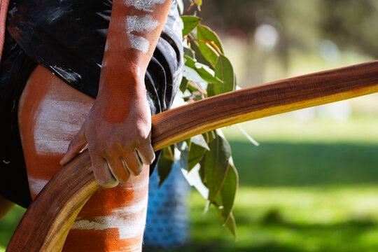 Close up of aboriginal male holding boomerang