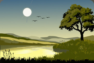 Obraz premium A beautiful summer landscape with a green meadow, a tranquil lake, and mountains under a blue sky with clouds at sunrise