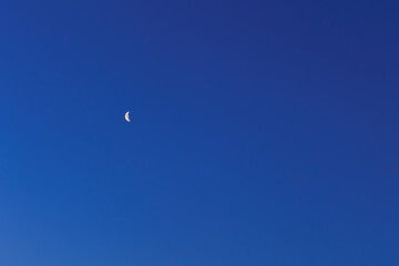 crescent moon at the blue sky at night for the web and design purposes