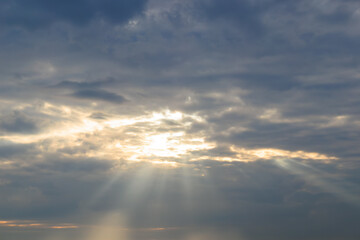 Fototapeta premium sunset sky with clouds and sunbeams, can be used as background