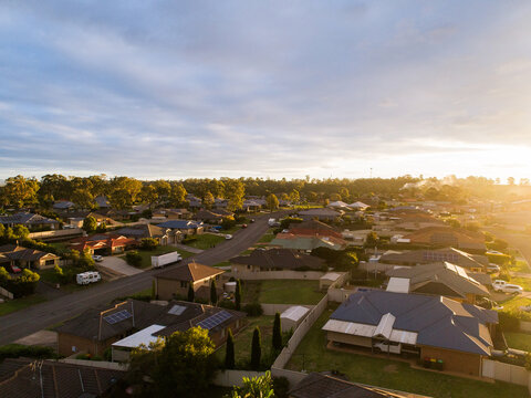 Aerial view of sunset light over homes in housing suburb of Singleton Heights in the Hunter Valley