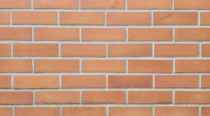 Orange brick fence, old brick fence with stains and black marks, old orange brick wall texture background, close-up photo of the wall.