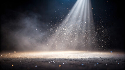 Illuminated spotlight shining down on a dusty surface with atmospheric particles floating
