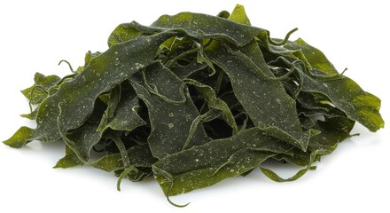 Pile of dried green kelp seaweed leaves with white speckles on a white background