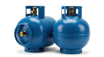 Two blue propane gas cylinders with brass valves isolated on a white background