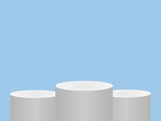 Three empty white podiums arranged in a row on a light blue background for award ceremonies