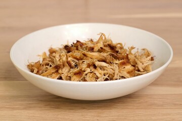 Shredded Pulled Lion's Mane Mushroom in White Bowl