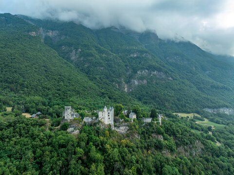 Perched dramatically atop a rocky spur in the Combe de Savoie, Miolans Castle is a formidable medieval fortress in the French Alps