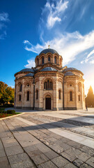 Fototapeta premium Grand Old Cathedral with Intricate Classical Architecture Under Blue Sky
