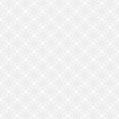 Subtle geometric pattern of small white dots on a light gray background