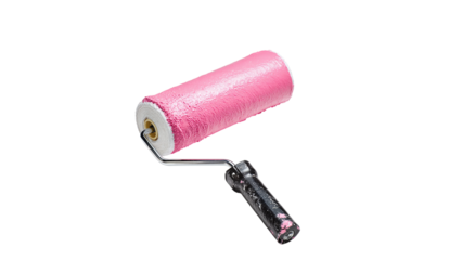 A close up shot of a pink paint roller with a silver handle against a black background studio shot
