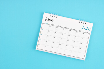 June 2026 Monthly desk calendar for 2026 year on blue color background.