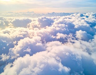 Aerial View of a Sea of White Cumulus Clouds with Sunlight and Blue Sky