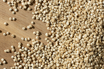 Macro Top View of Uncooked White Quinoa. Healthy Grain Background.