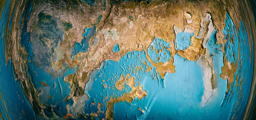 An abstract image on the wall, resembling Earth with continents and oceans.