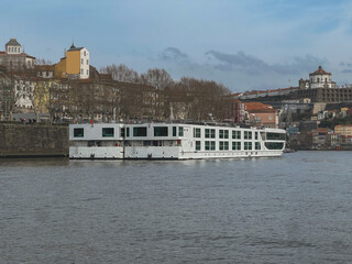 Luxury river cruiseship cruise ship liners docked at pier getting ready for Douro summer Portugal...