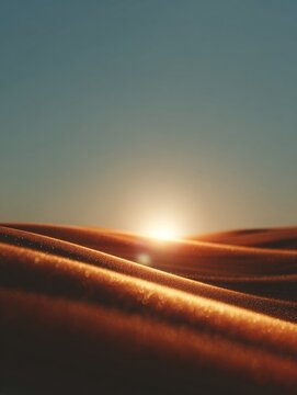 Golden sunset over a desert landscape.