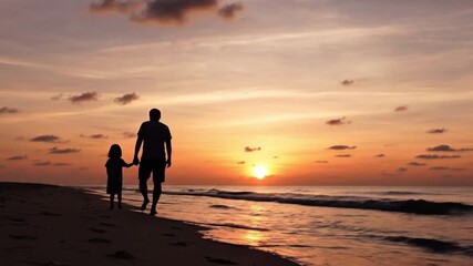 Father and daughter walking on beach at sunset - Powered by Adobe