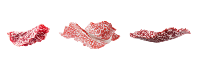 A collection of fresh wagyu beef cuts with a rich marbled texture, isolated on a transparent background. PNG