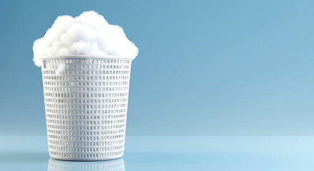 White perforated basket filled with fluffy white cotton balls against a blue background container receptacle