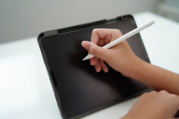 Teenage using tablet for communication, search data internet website to learn.