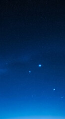 Dark blue night sky filled with numerous stars, creating a celestial and peaceful atmosphere, showcasing the vastness of space, ideal for calm or cosmic themes