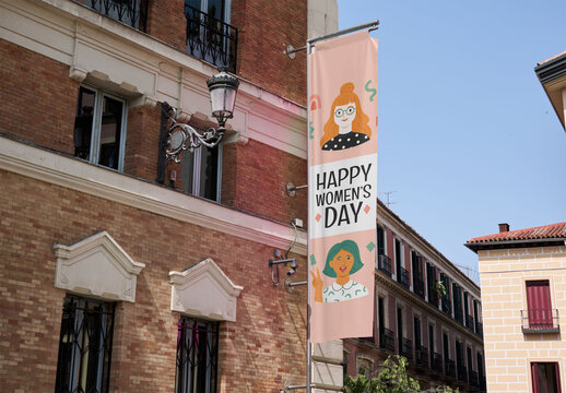 Mockup of Fly Banner Displayed on Urban Building in Madrid, Spain.