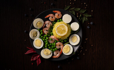 Plate filled with a vibrant arrangement of seafood and vegetables