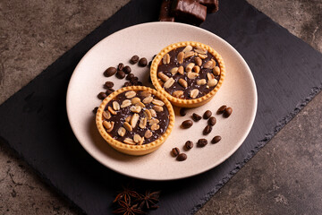 Delicious composition with two chocolate tarts