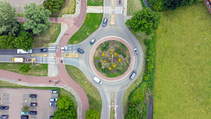 Aerial topshot from a roundabout with traffic in the Netherlands