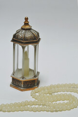 Islamic lanterns isolated on a dark background, the concept of Ramadan, Eid al-Fitr, and other Islamic holidays. Stunning Ramadan candle lanterns with free space