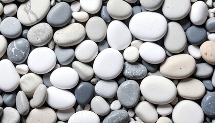 Pile of Smooth Gray and White Beach Pebbles Full Frame Texture Background
