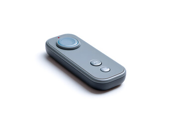 Bluetooth camera remote on white background. Minimal tech accessory ideal for e-commerce and product mockups.