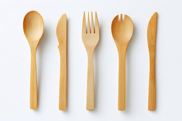 Wooden cutlery set isolated on white background. Eco-friendly alternative to plastic utensils.