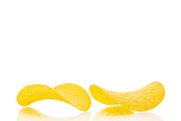 Crispy potato chips isolated on white background, close-up.