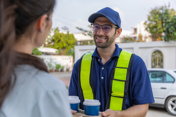 Delivery express courier young man use giving boxes or Food to woman customer  at front home
