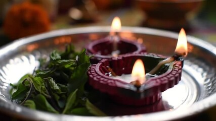 Celebrate Janmashtami Traditional Oil Lamps and Sacred Basil Leaves for the Auspicious Occasion's Festive Vibe and Spiritual Harmony 