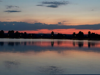 Naklejka premium sunset over the river