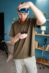 traveler adjusting action camera using smartphone