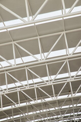 Detail of the metal truss of a sports hall