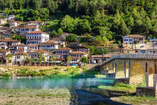 Historical Ottoman Houses in neighborhoods Gorica and Mangalem in Berat, with bridges over river Osum, Albania.