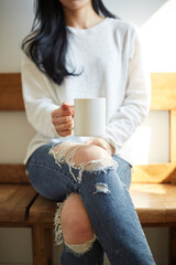 A Korean woman resting at home on holidays.
