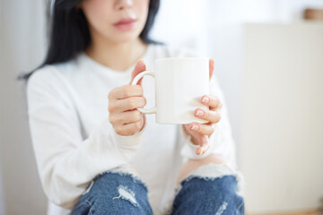 A Korean woman resting at home on holidays.
