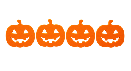 Four orange jackolanterns with carved faces in a row isolated on transparent background