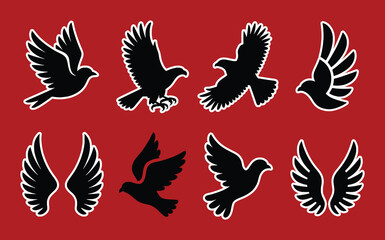 Black bird and wing silhouettes in flight on a red background vector